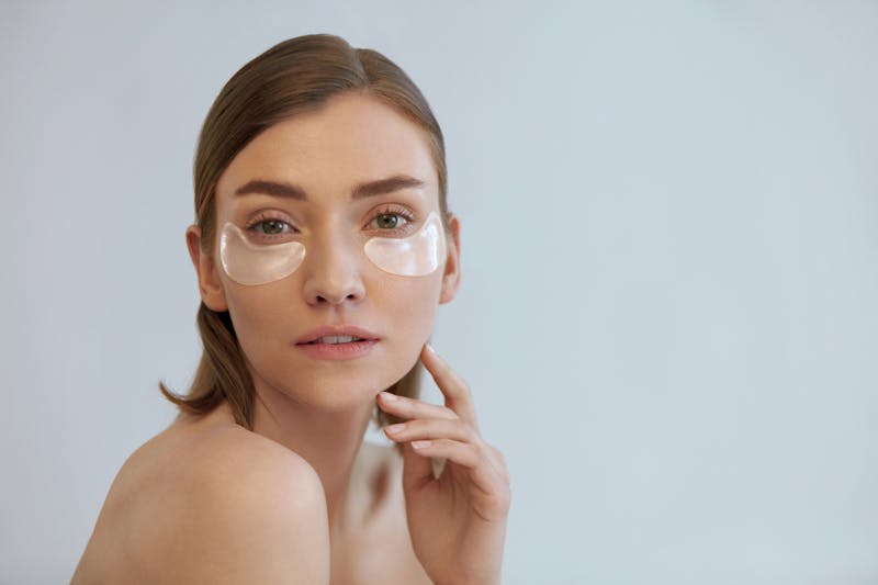 Woman wearing under eye ask to prevent bags