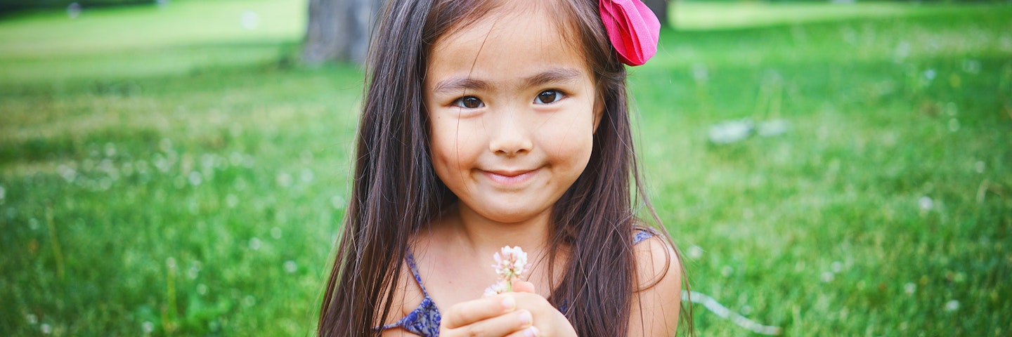Child and flower