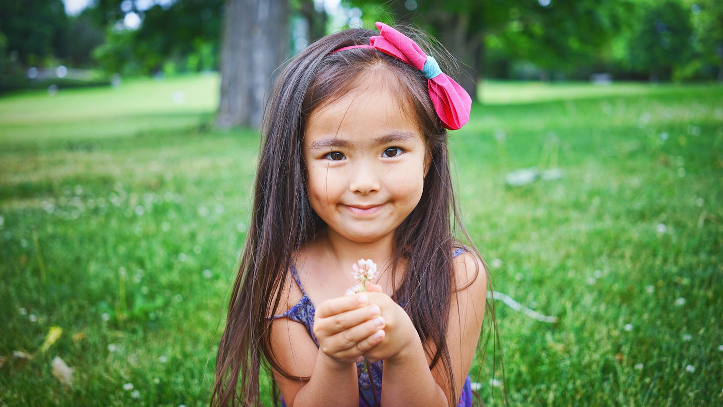 Child and flower