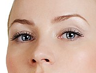 close up of woman with thin eyebrows