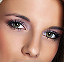 brown haired model with purple eye makeup