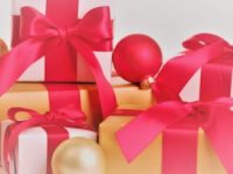 gifts wrapped with red ribbon