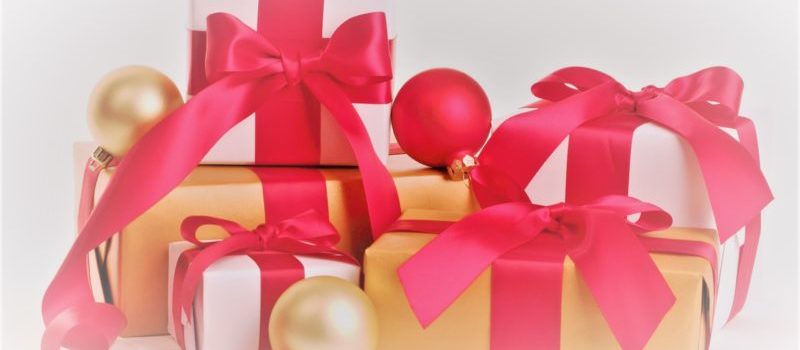 gifts wrapped with red ribbon