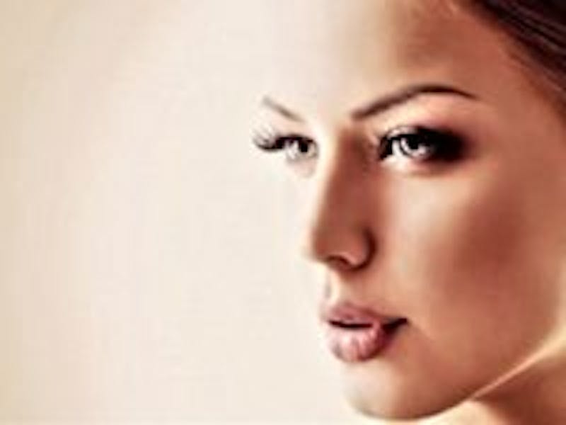 woman looking at something intently