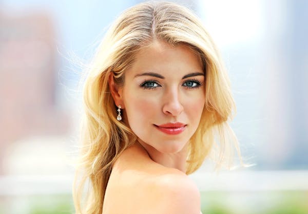 Beautiful woman with blonde hair and blue eyes