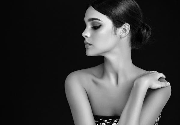 Black and white photo of a woman with chiseled facial features