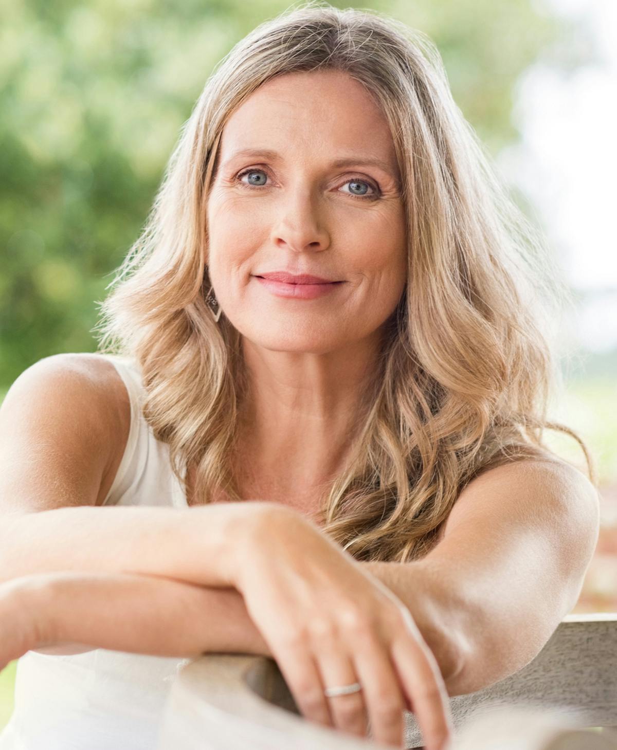 Middle-aged woman with blonde hair after a neck lift in nyc