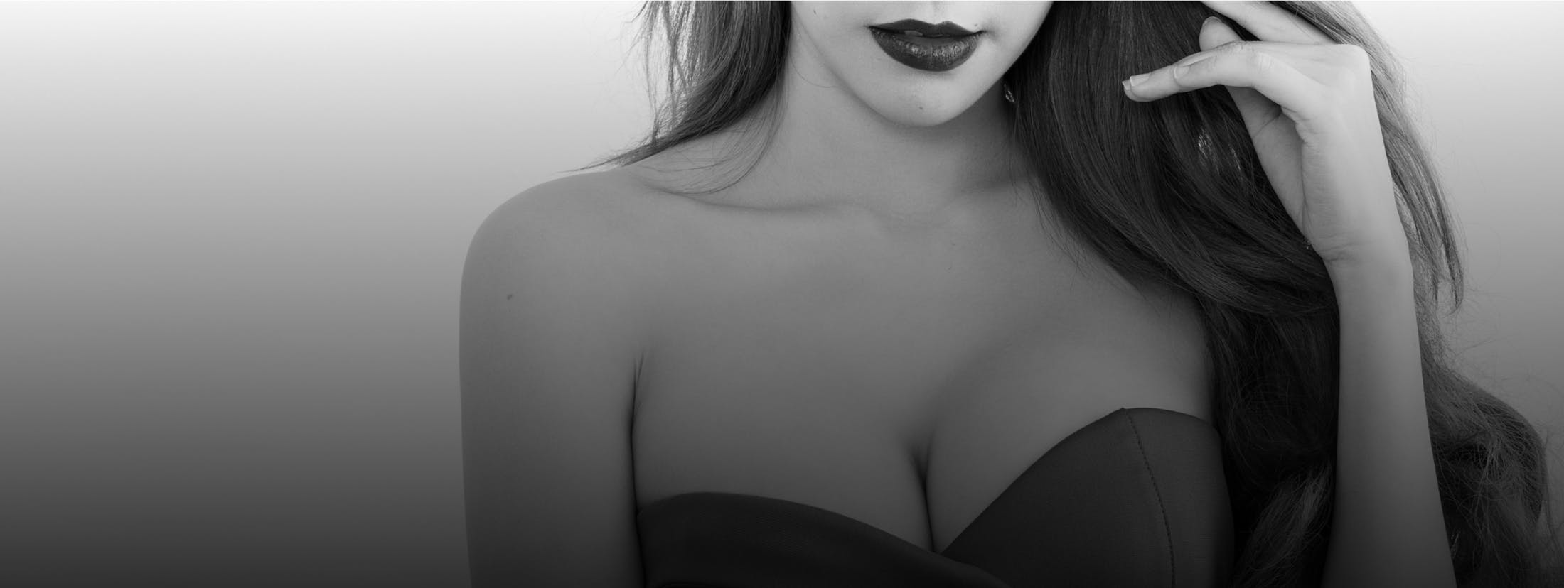 woman wearing black dress and lipstick