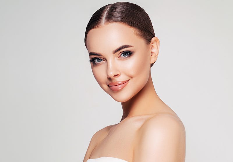 beautiful woman with hair slicked back