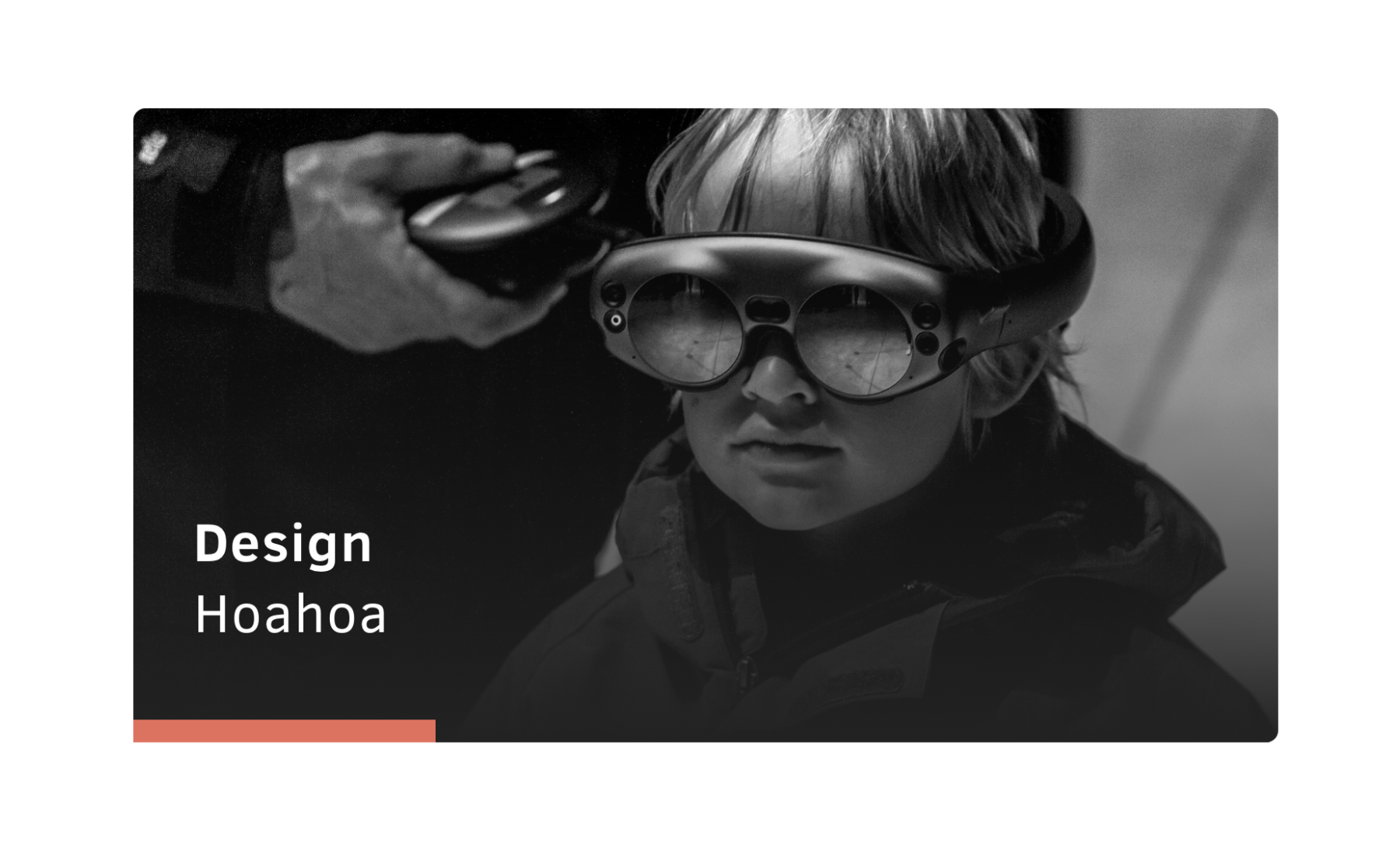 A boy wearing weird googles with "Design Hoahoa" written in the corner