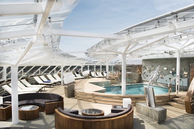 MSC Yacht Club - The club’s private sundeck, complete with a private pool, whirlpool, sundeck and bar  (Image at LateCruiseNews.com - October 2023)