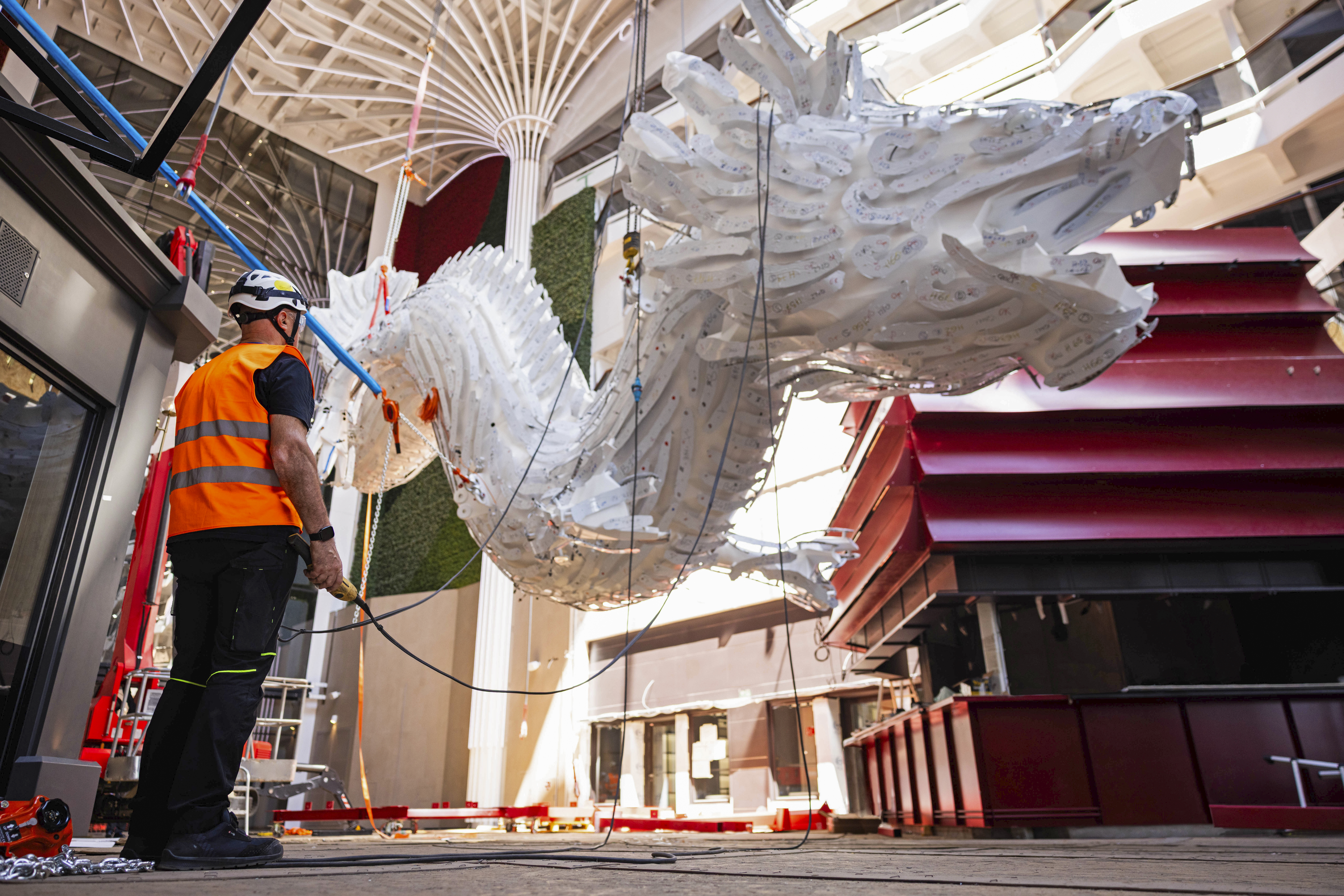 MSC Cruises Installs Dragon Sculpture Aboard MSC World Asia (Image at LateCruiseNews.com - August 2026)