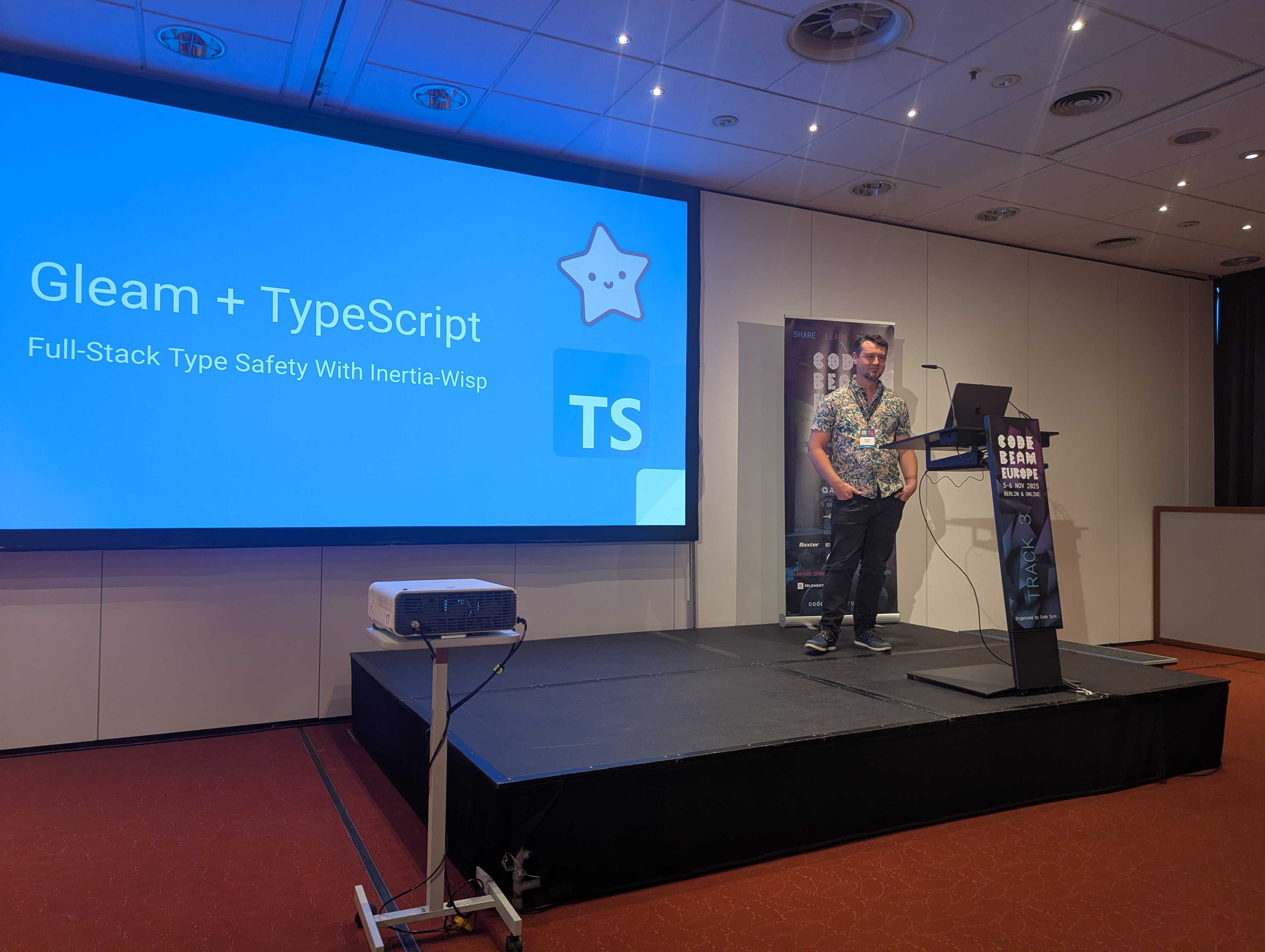 CodeBEAM EU 2025 - Michael Buhot on stage. Photo by Conor Sinclair