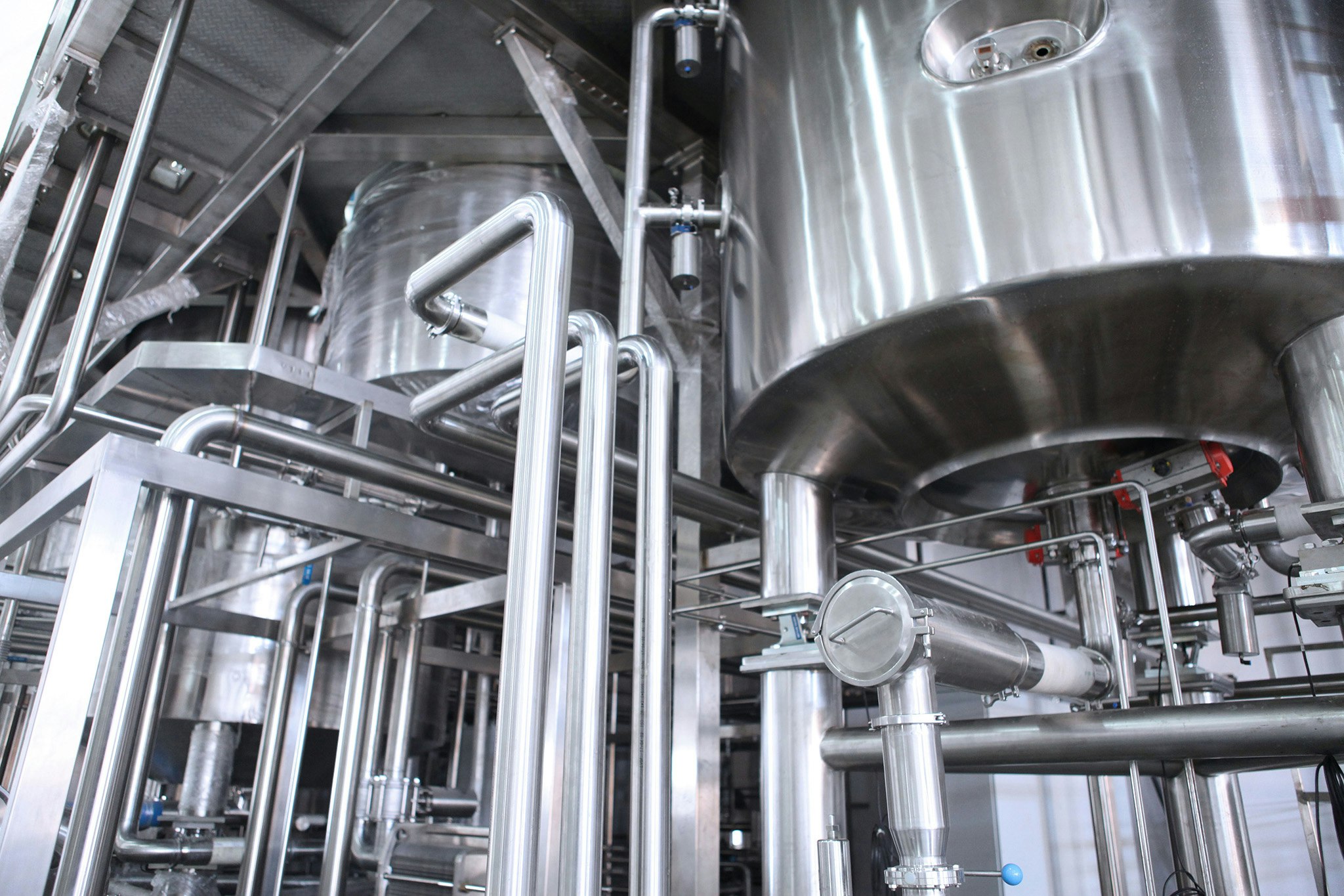 Interior from a factory showing steel containers