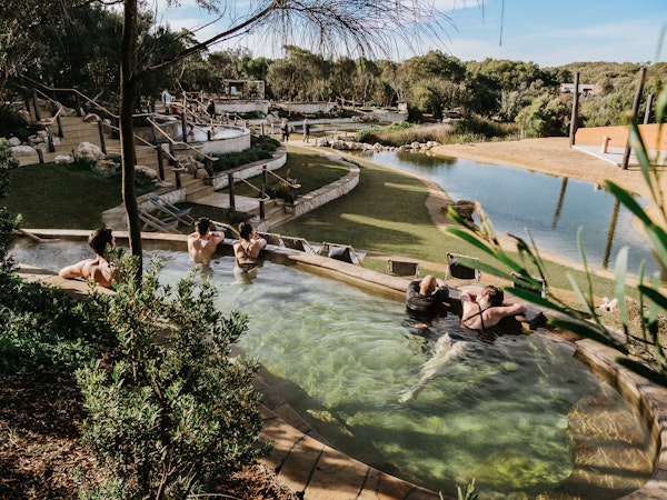 group relaxing in amphitheatre