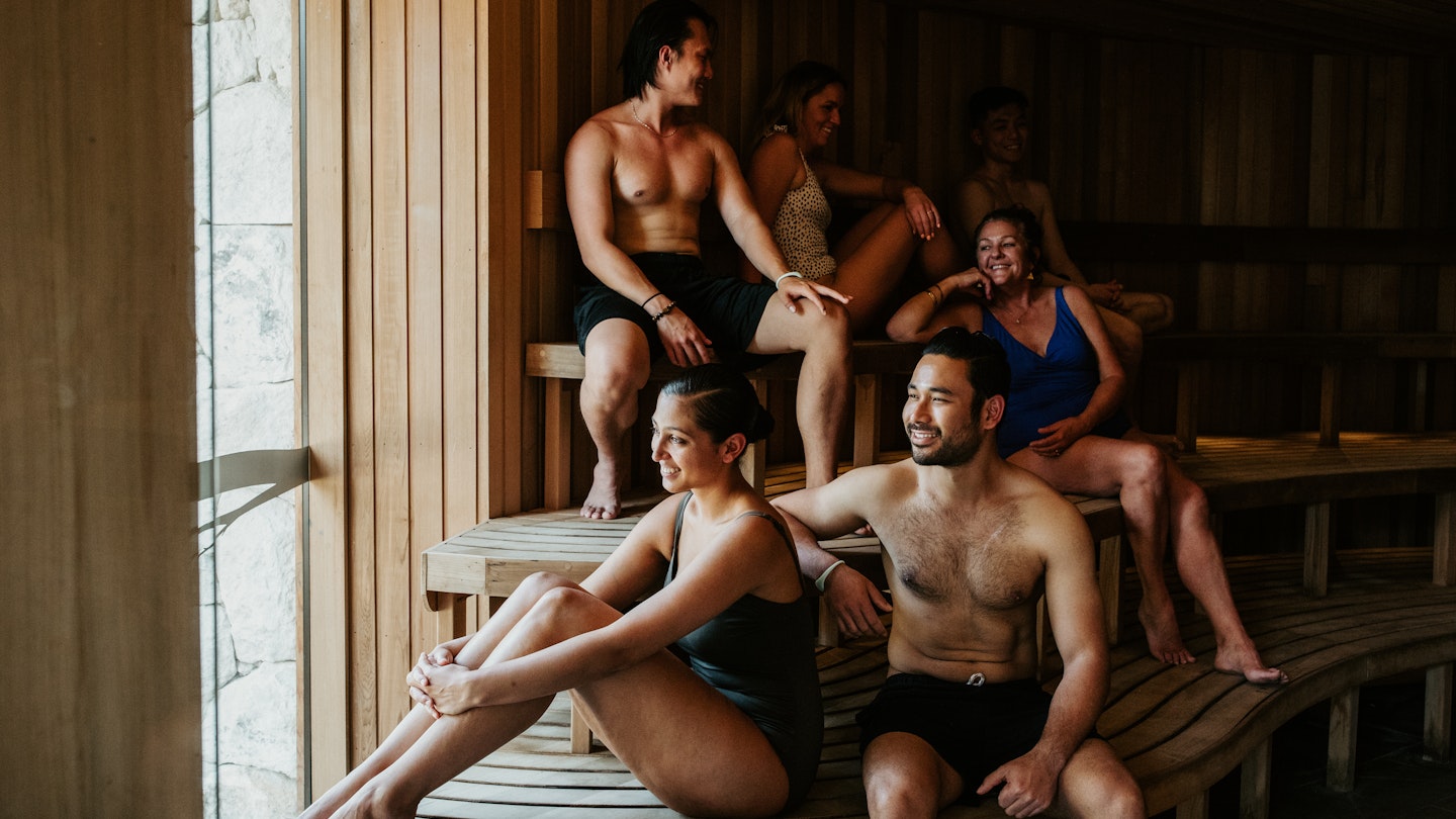 a group of friends in a sauna