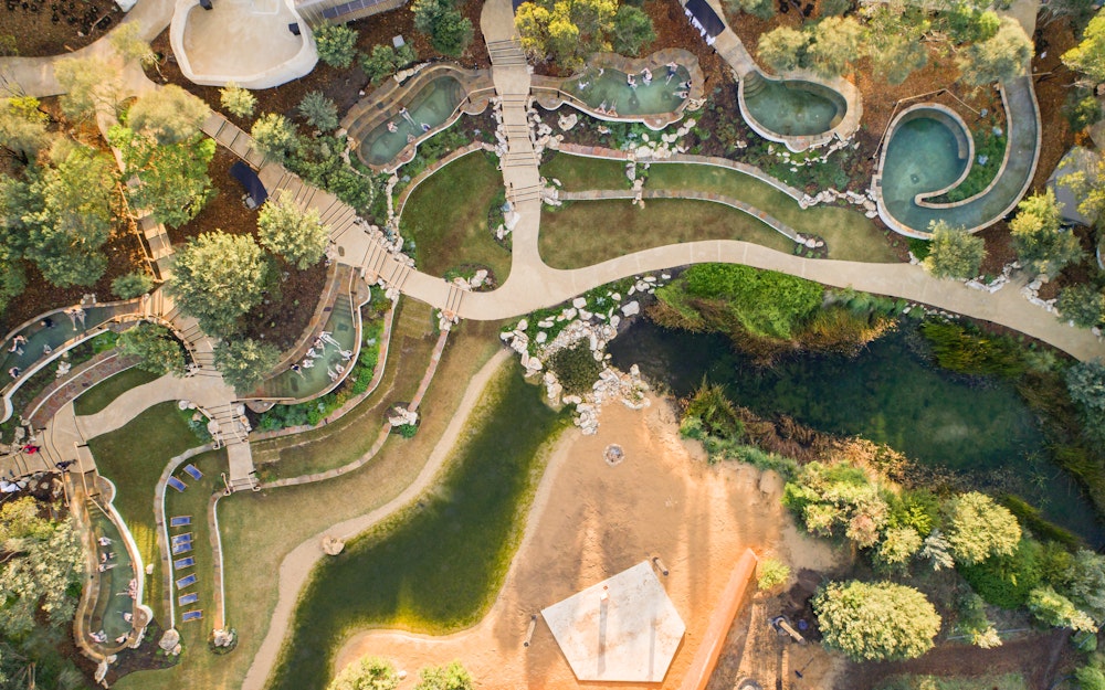 Aerial view of bath house amphitheatre with hot pools and stage in view