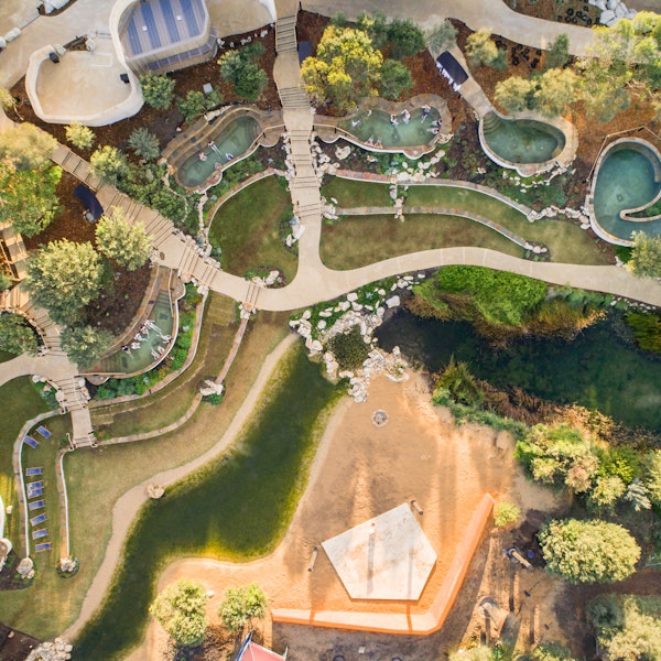 Aerial view of bath house amphitheatre with hot pools and stage in view
