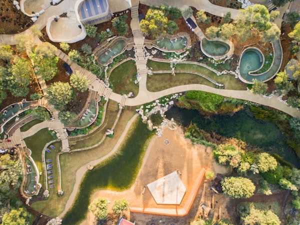 Aerial view of bath house amphitheatre with hot pools and stage in view
