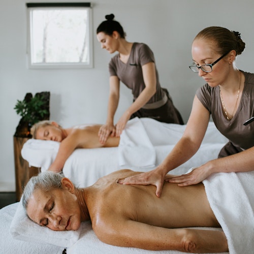 people relaxing with a massage