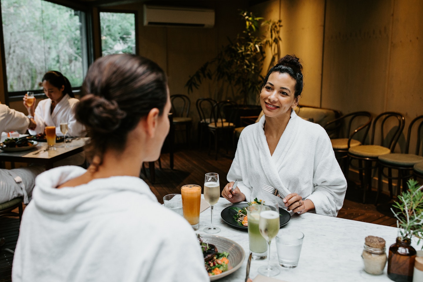 friends enjoying food in spa dreaming centre dining room