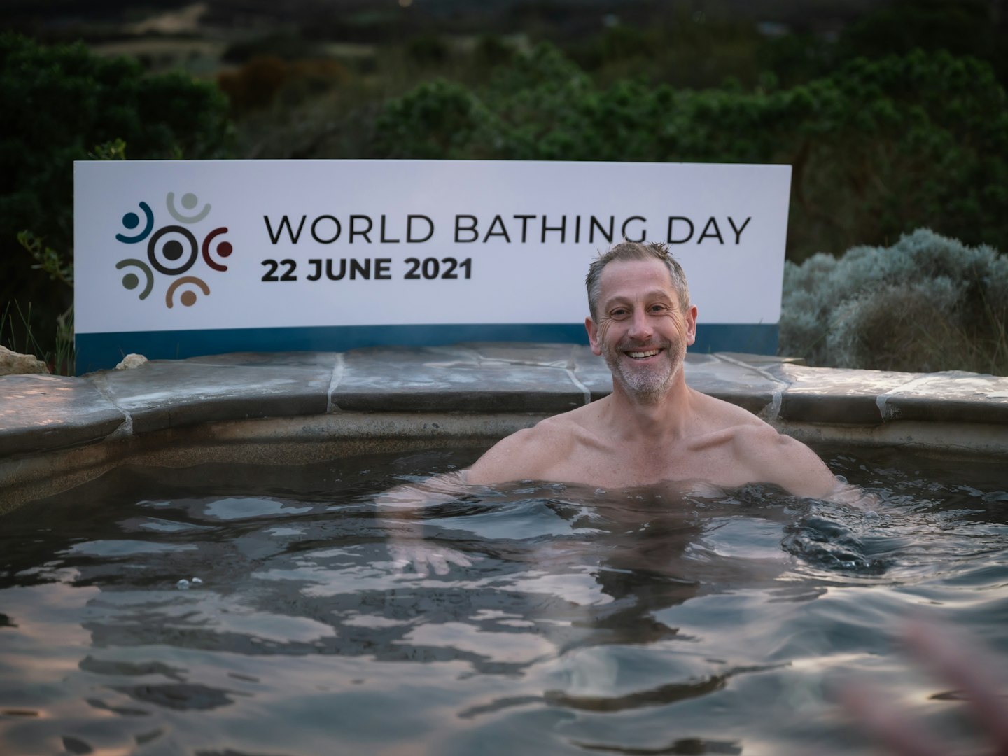 World bathing day June 2021 man in pool