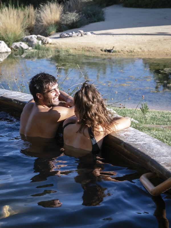 couple in amphitheatre pool