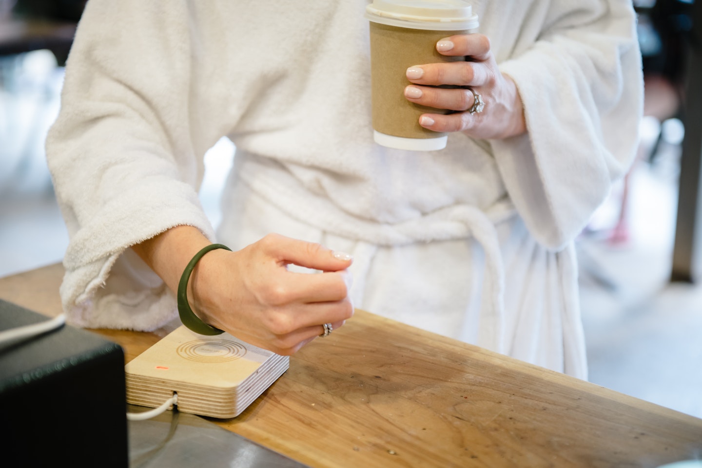 cafe customer paying the bill