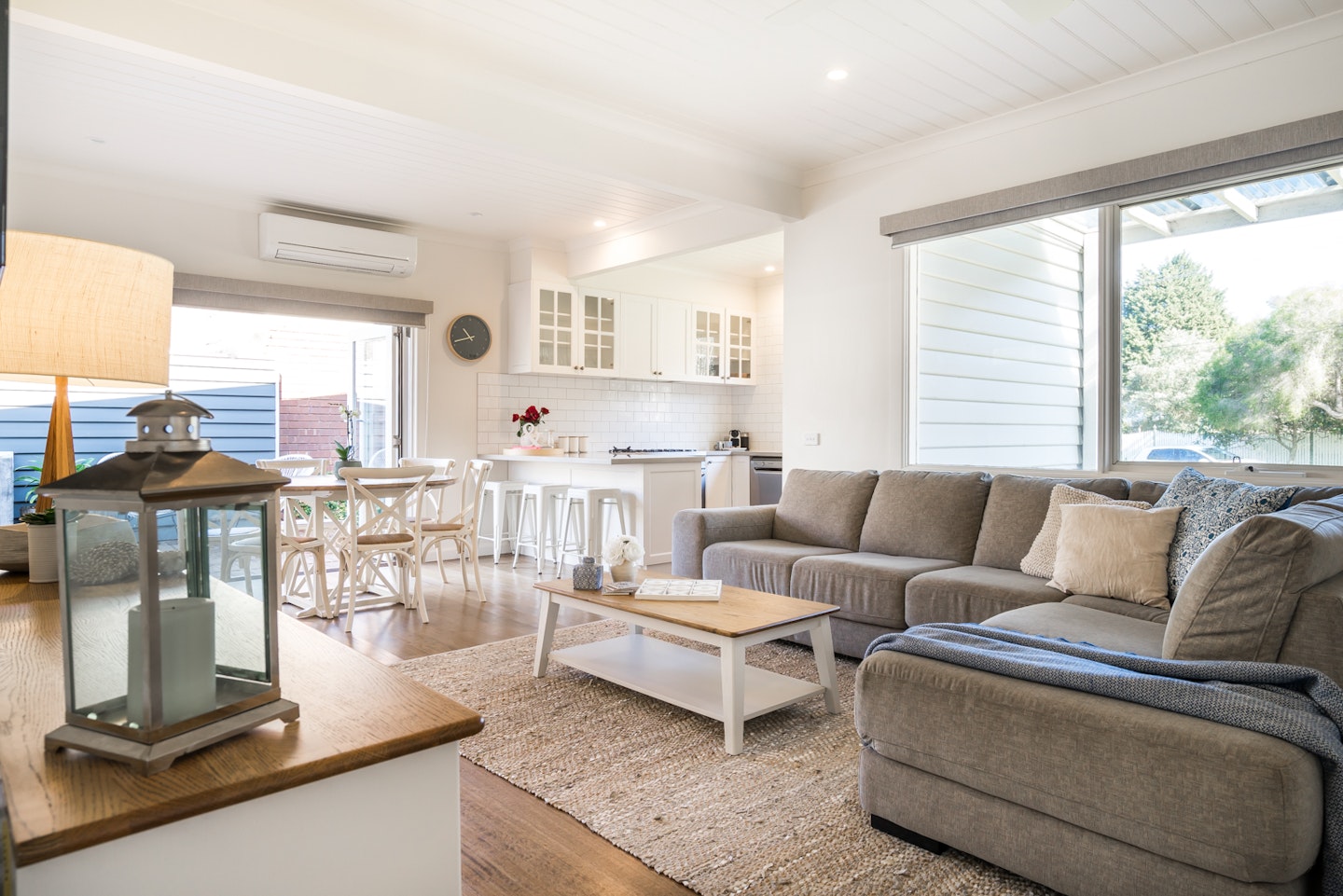 view of cosy living room, dining and kitchen of holiday home