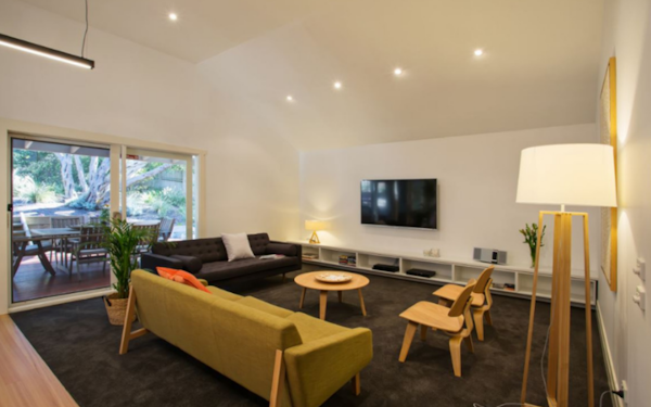 cosy living room and view to outdoor setting on deck