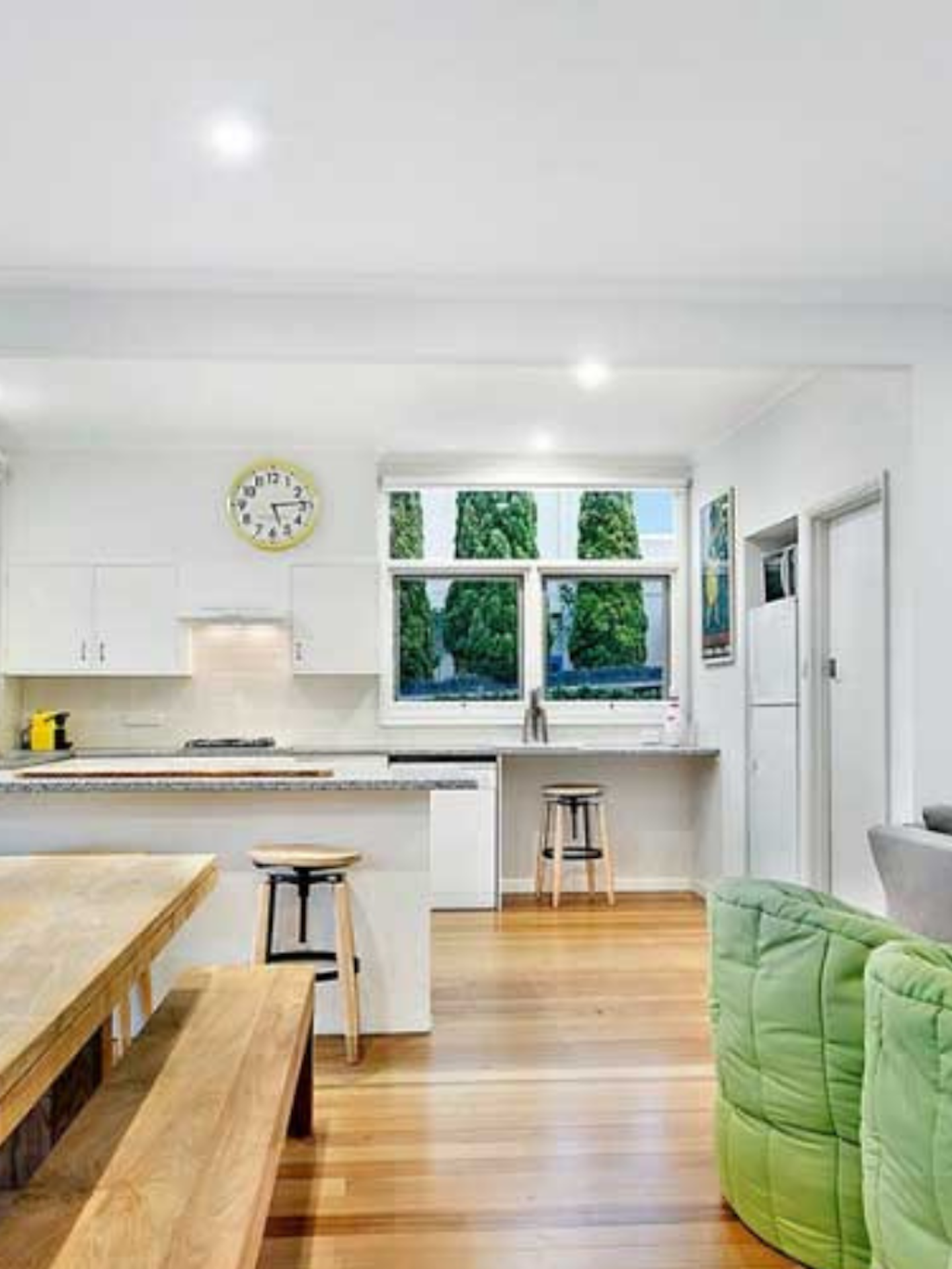 bright and sunny living, kitchen and dining areal of beach house