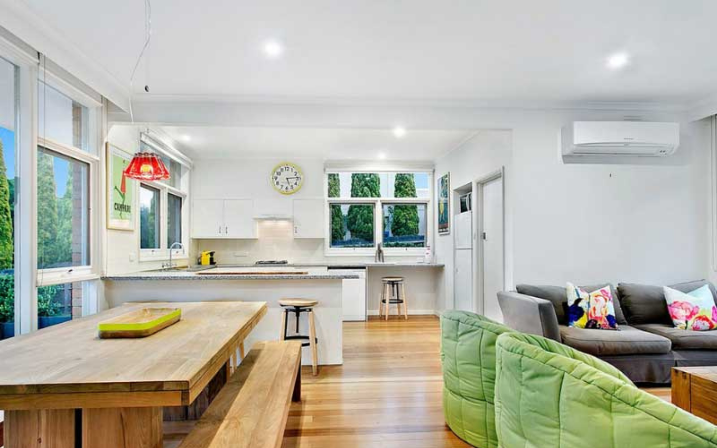 bright and sunny living, kitchen and dining areal of beach house