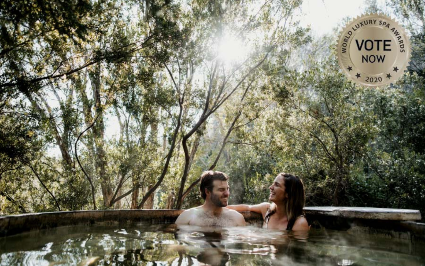 a man and a woman in a pool