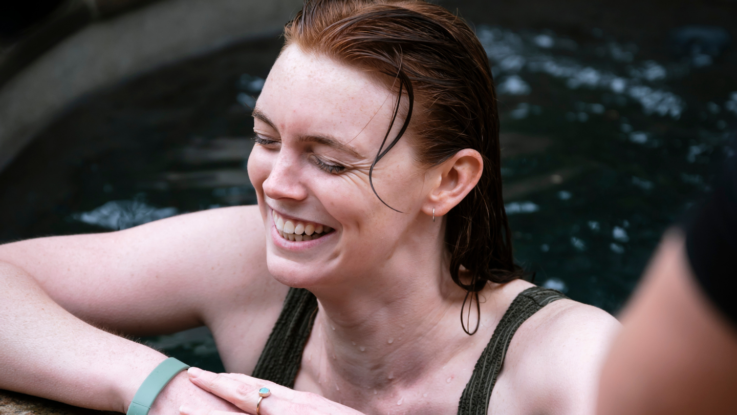girl laughing in plunge pool