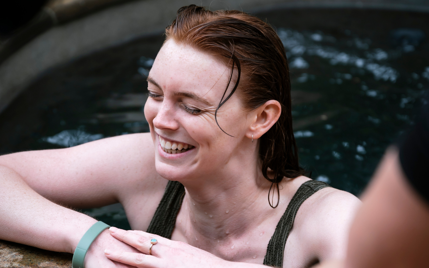 girl laughing in plunge pool