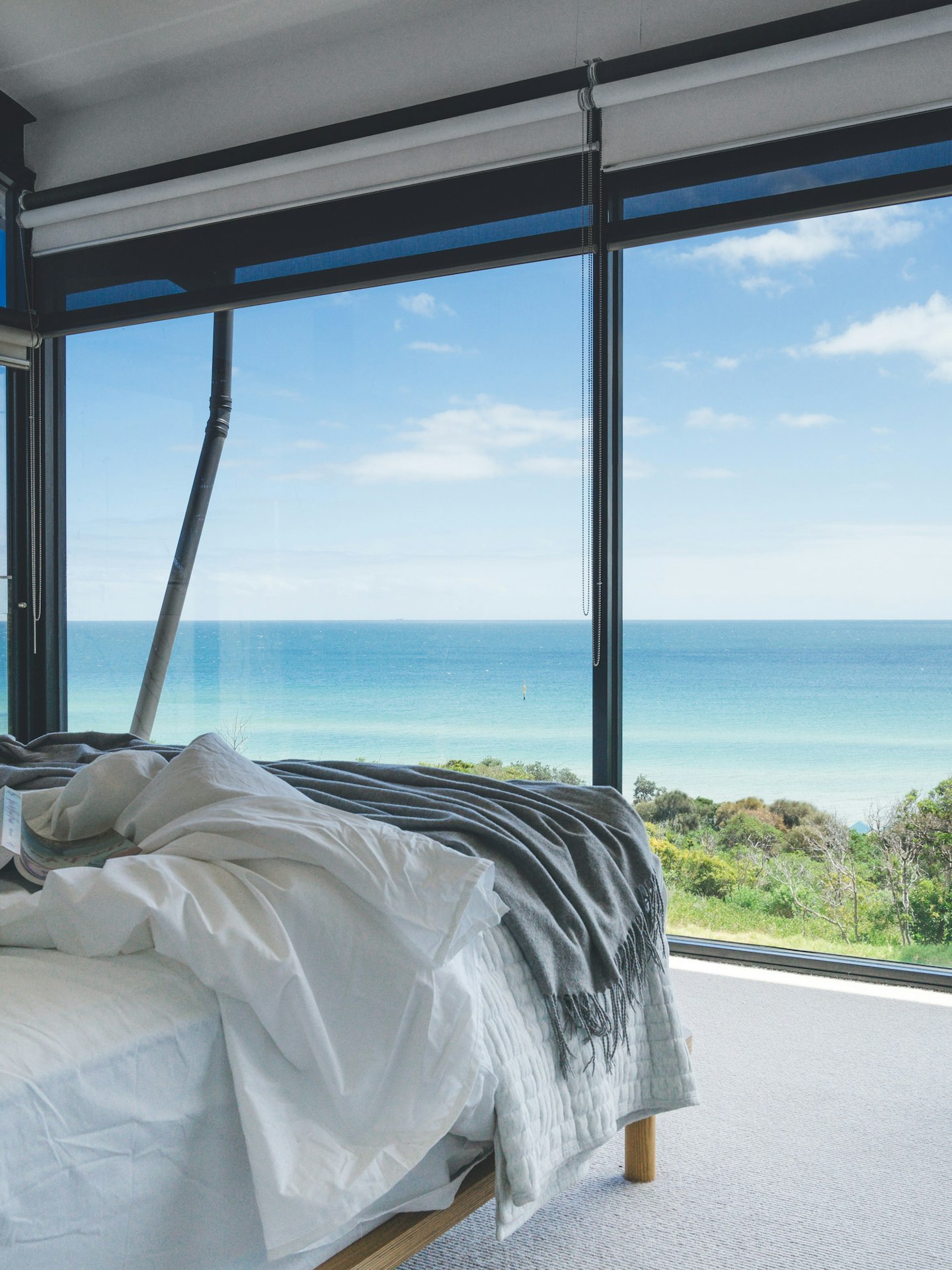a bed looking out to the ocean