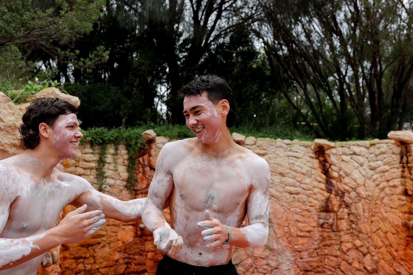 two boys with body clay on them