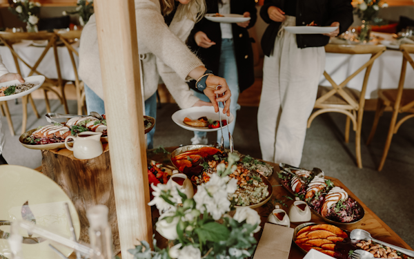 a person grabbing food
