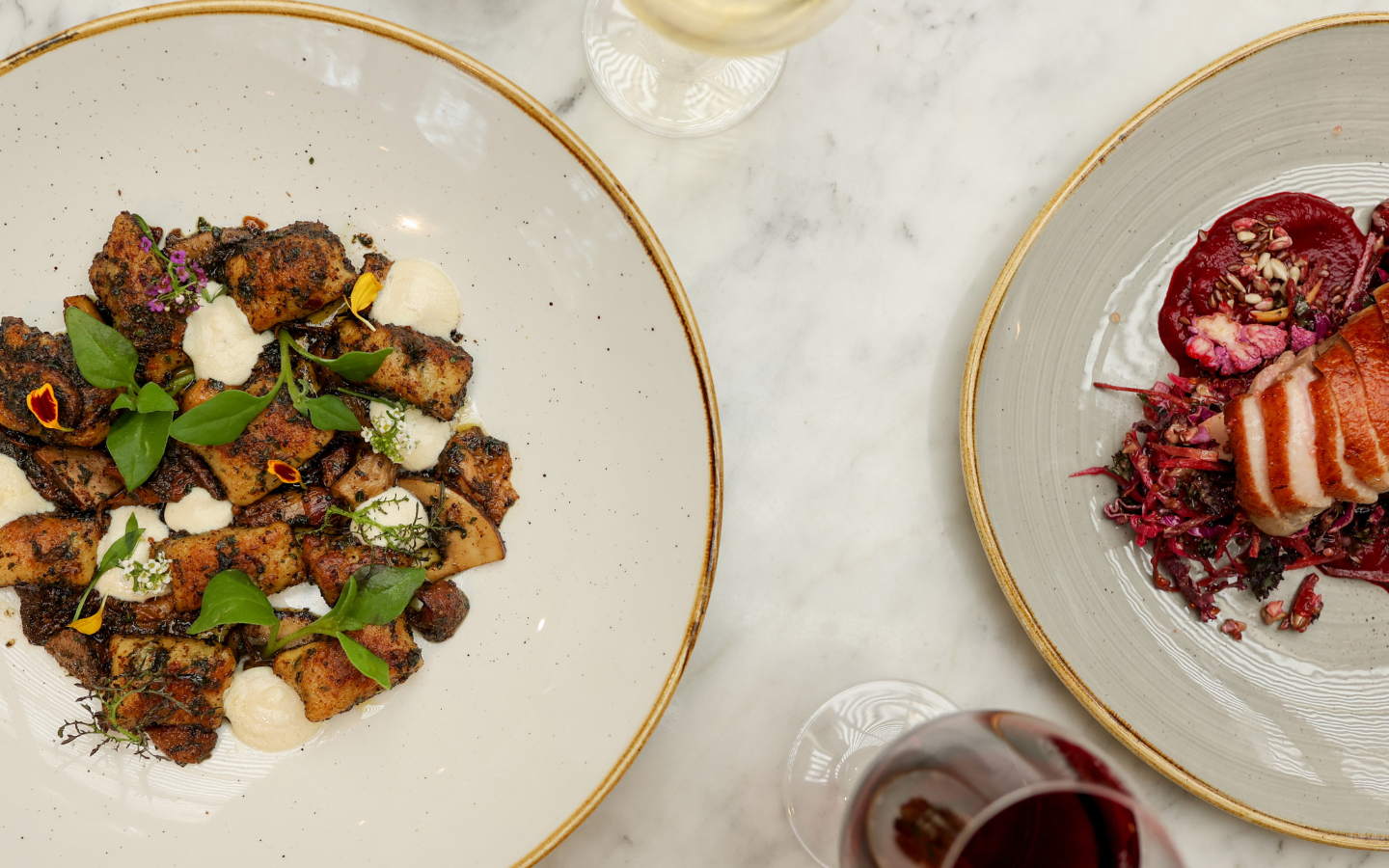 a plate of gnocchi and duck
