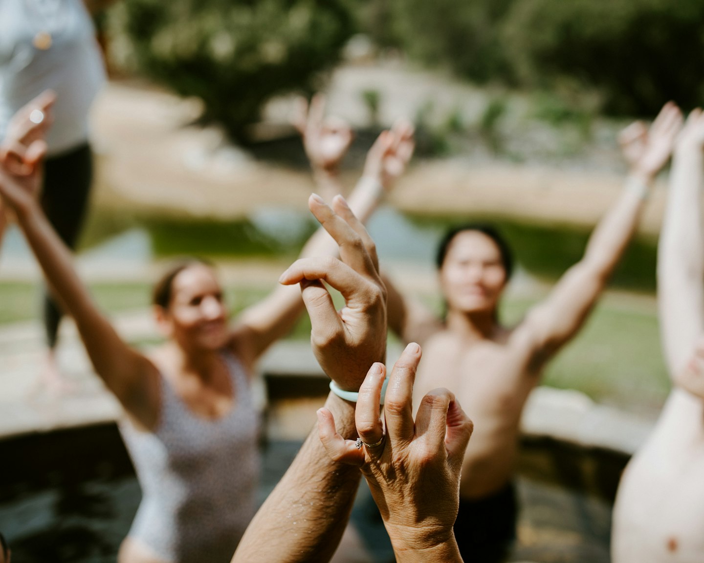 a group of people doing a yoga pose