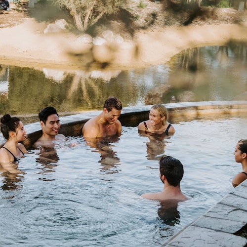 a group of friends in a pool