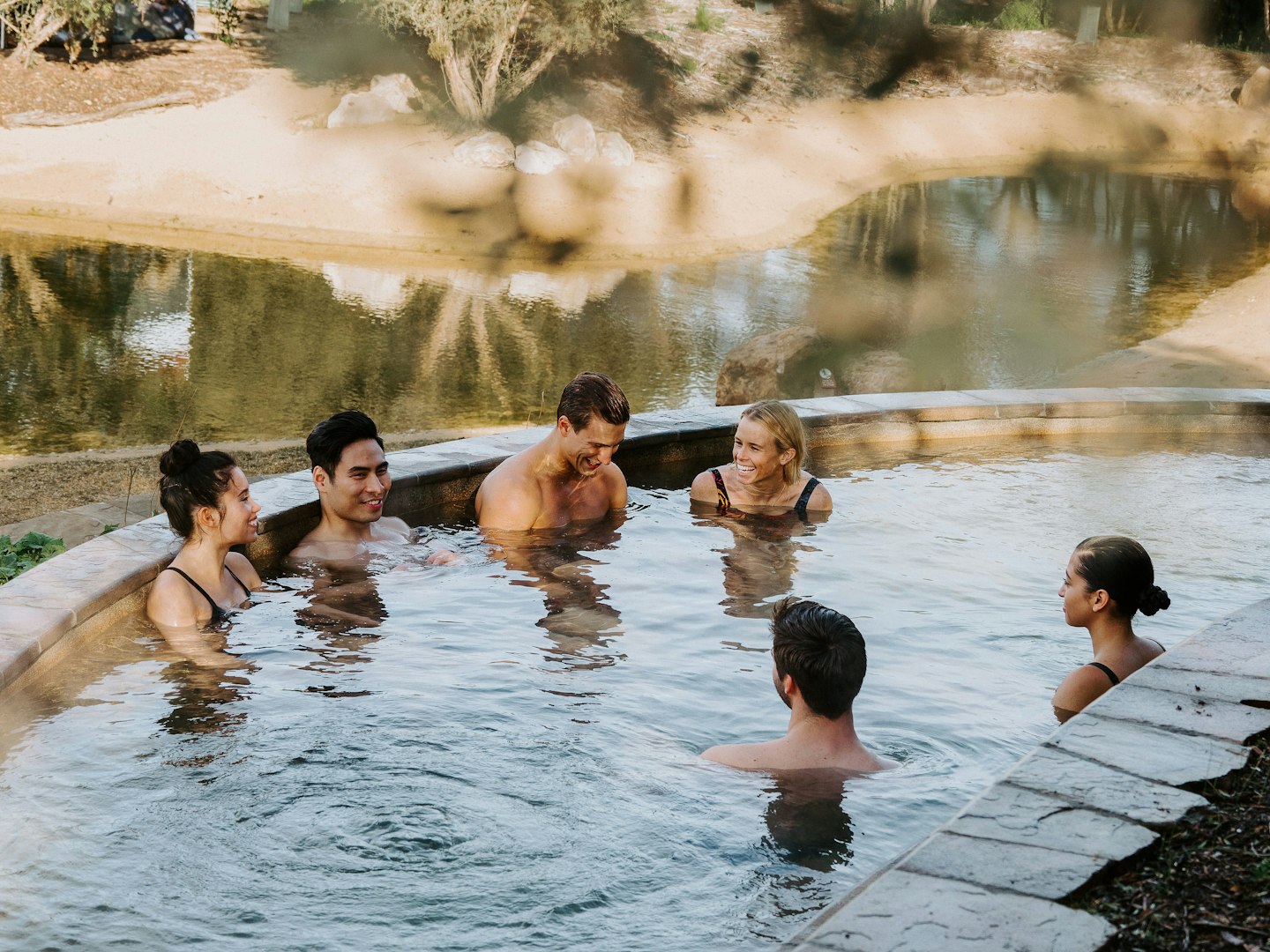 a group of friends in a pool