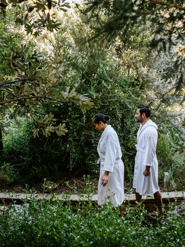 two people walking on the reflexology walk