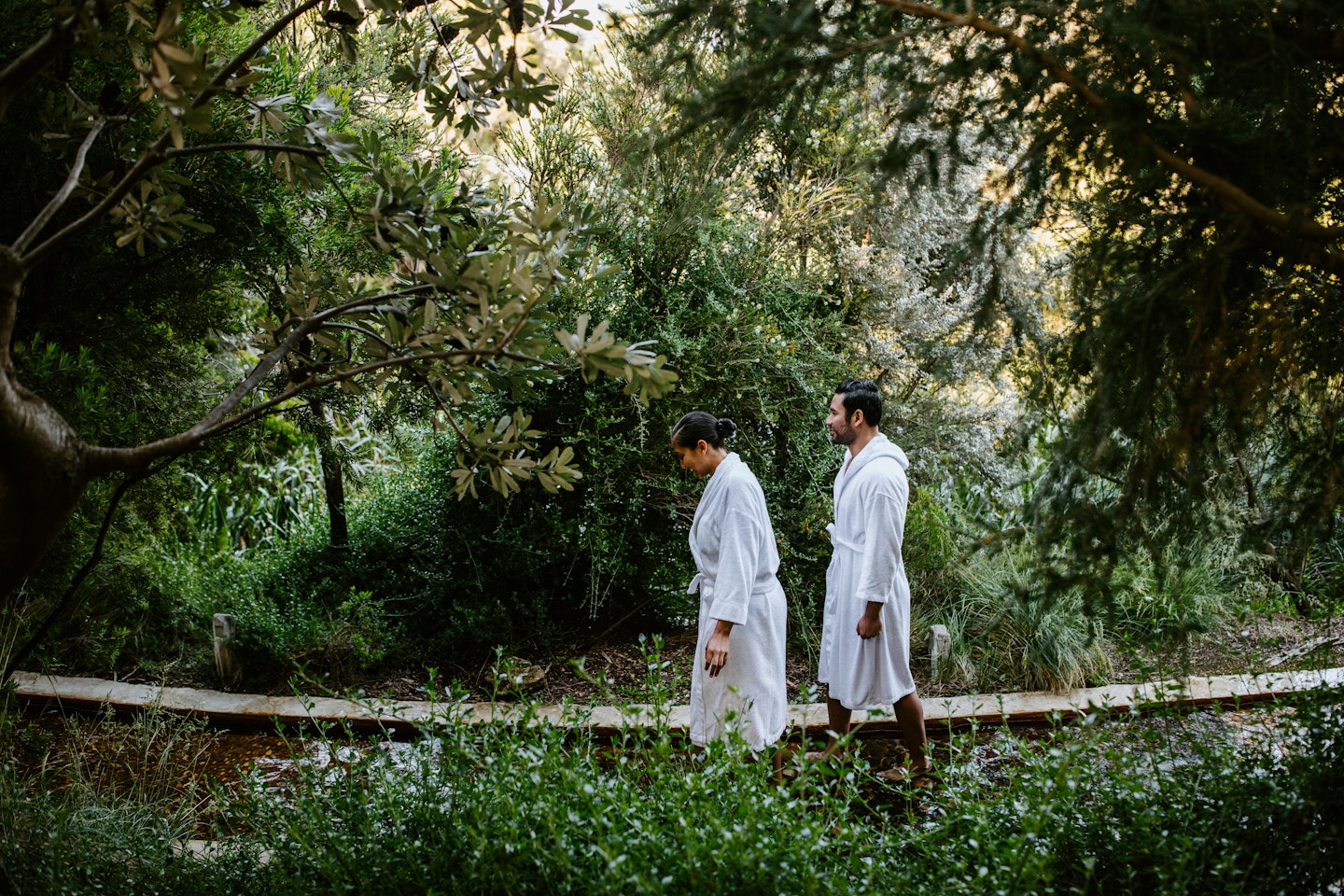 two people walking on the reflexology walk
