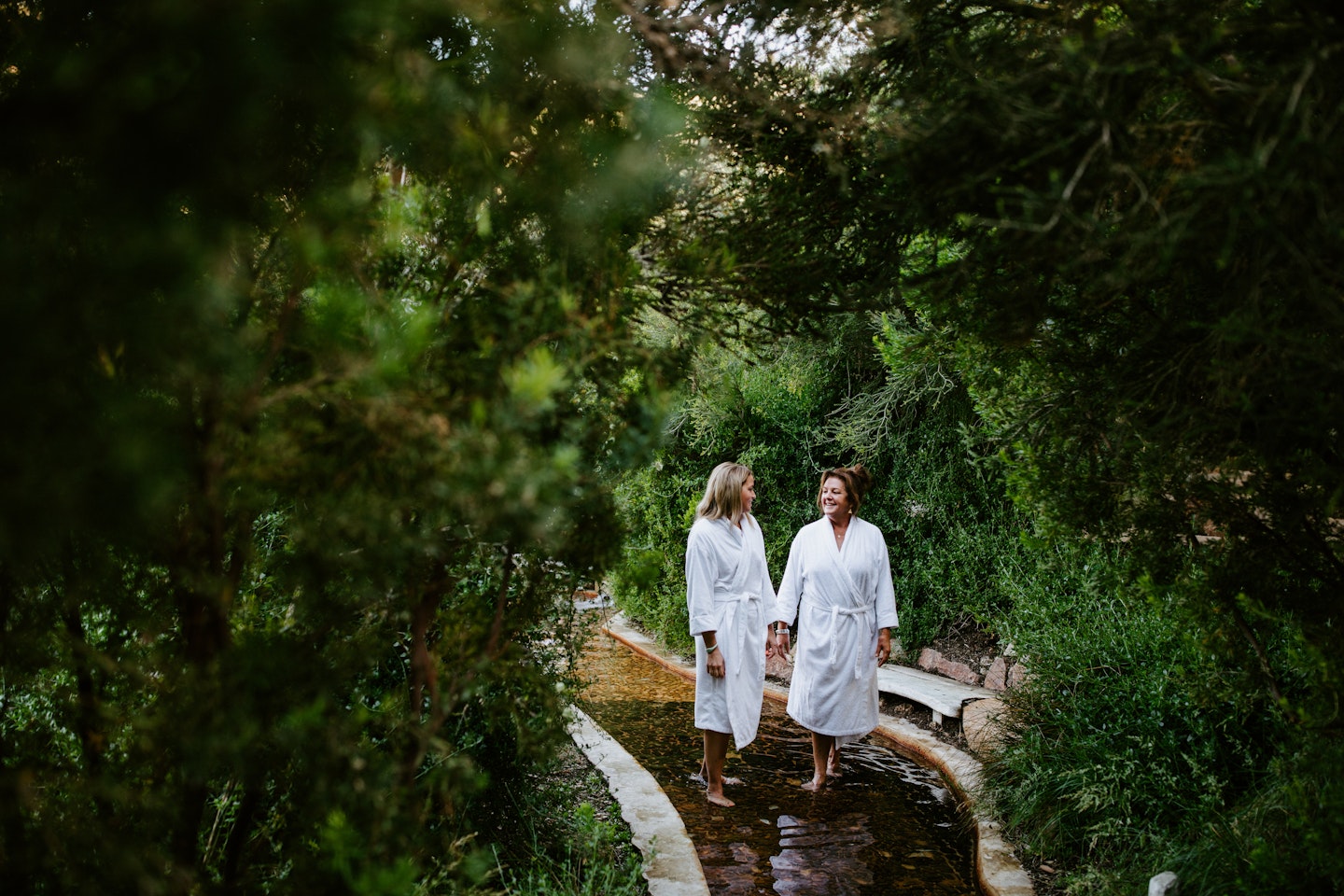 two women walking on the reflexology wal