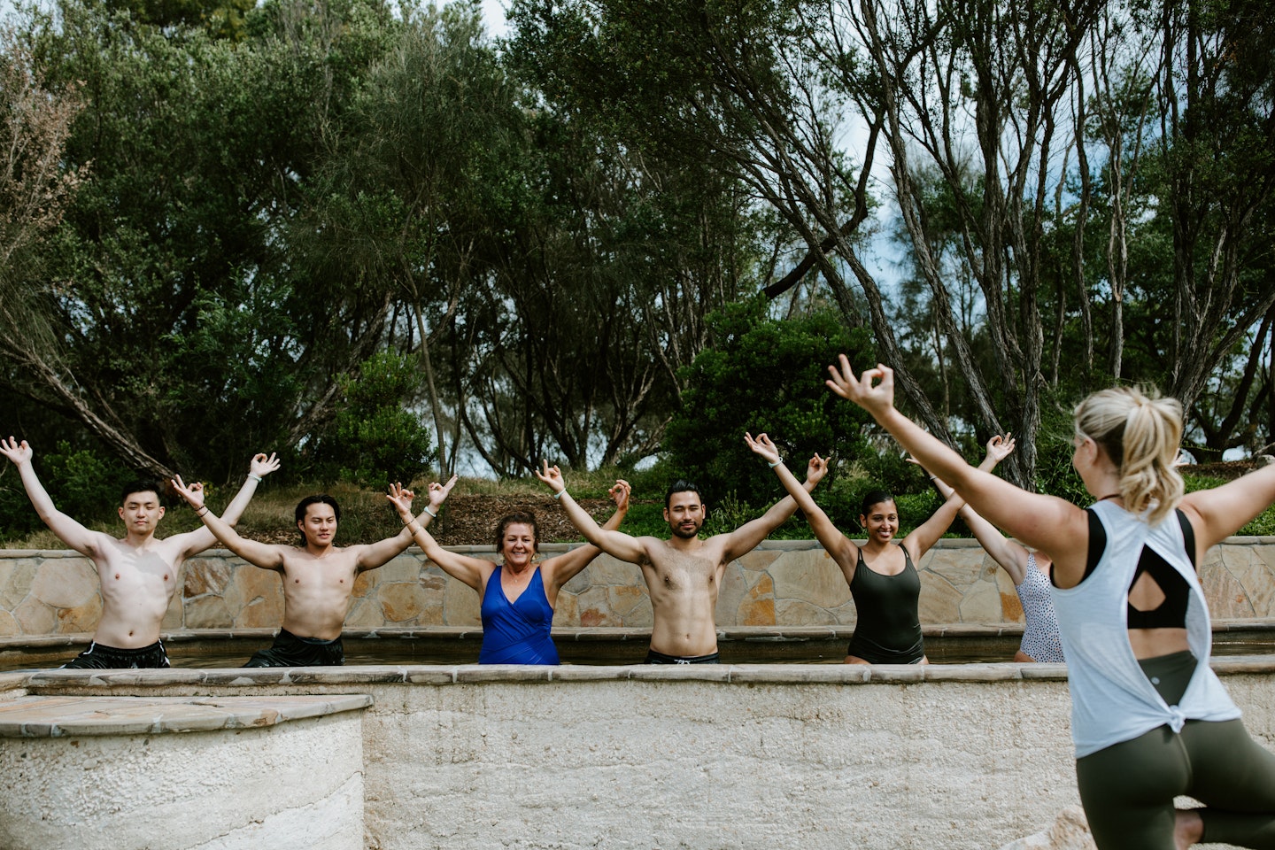 people doing yoga in the baths
