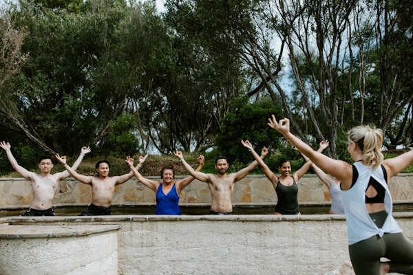people doing yoga in the baths