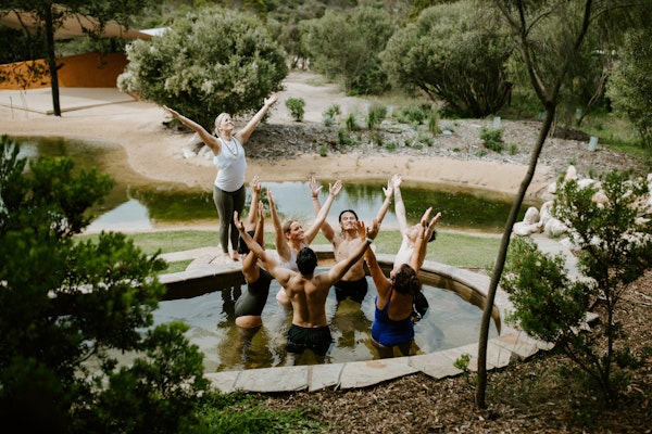 a group of people doing yoga