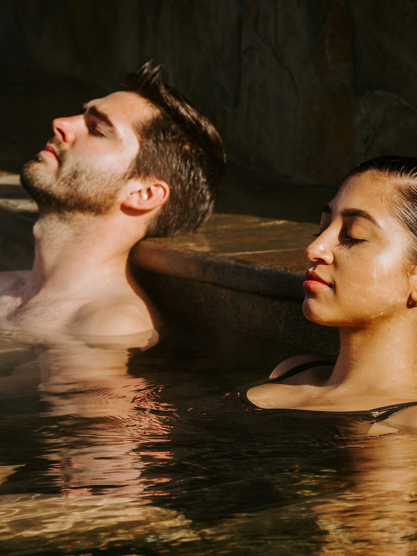 two people breathing in the pool