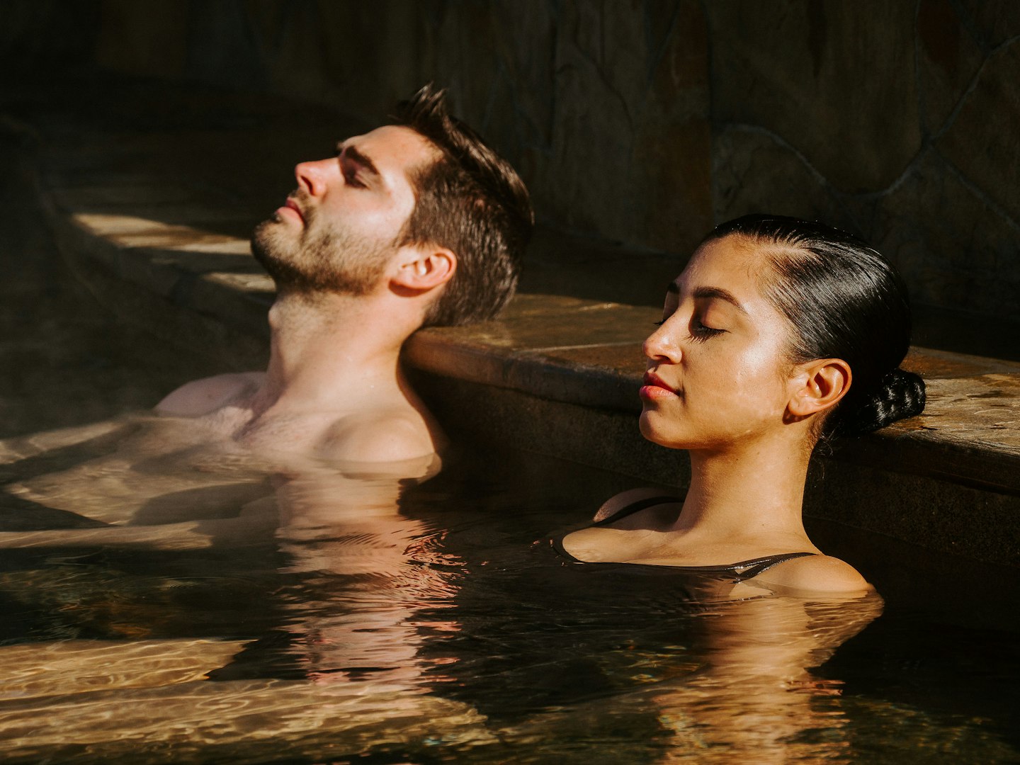 two people breathing in the pool